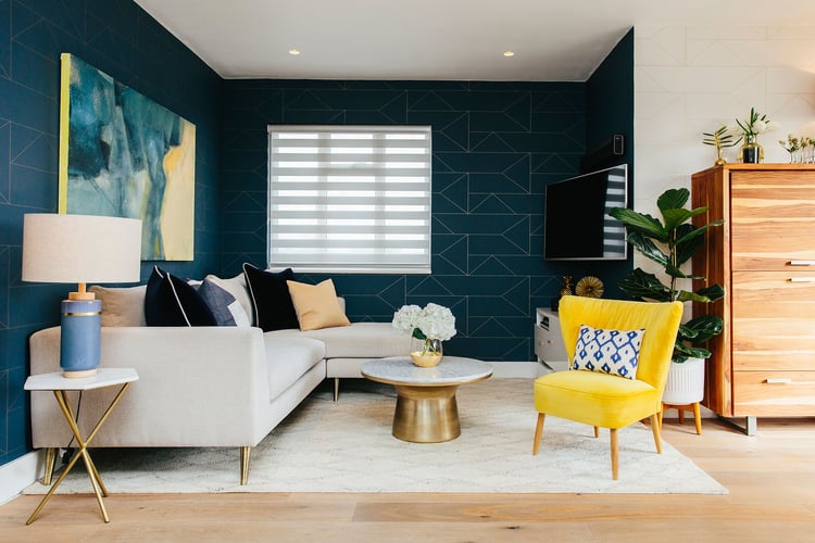 geometric modern living room design with yellow accents 
