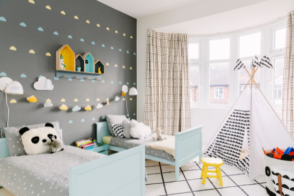 Grey colours being used in a childrens bedroom to create a positive mood and mental health benefits 