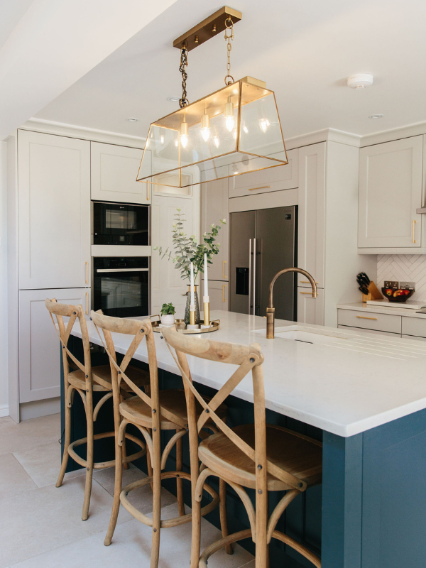 Kitchen Island with glass/brass hanging light
