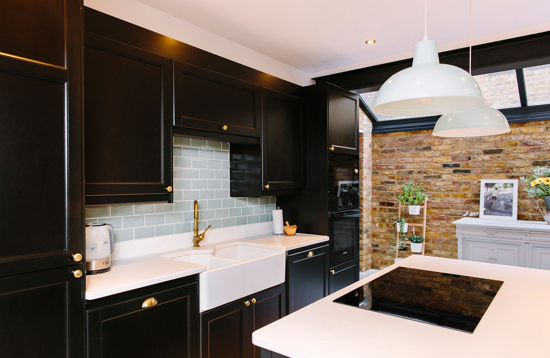 Black cabinets with gold handles