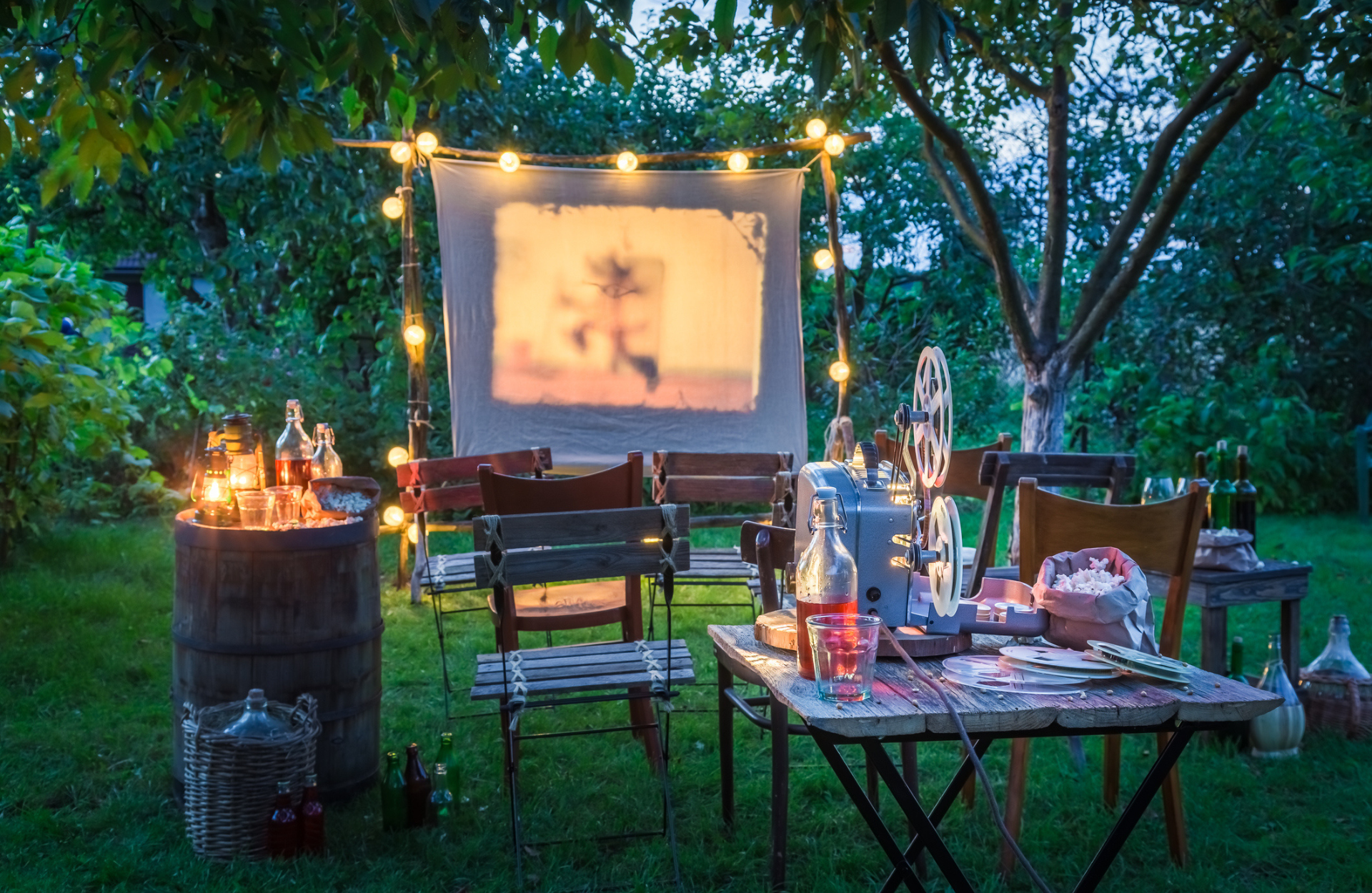 outdoor projector with chairs and drinks