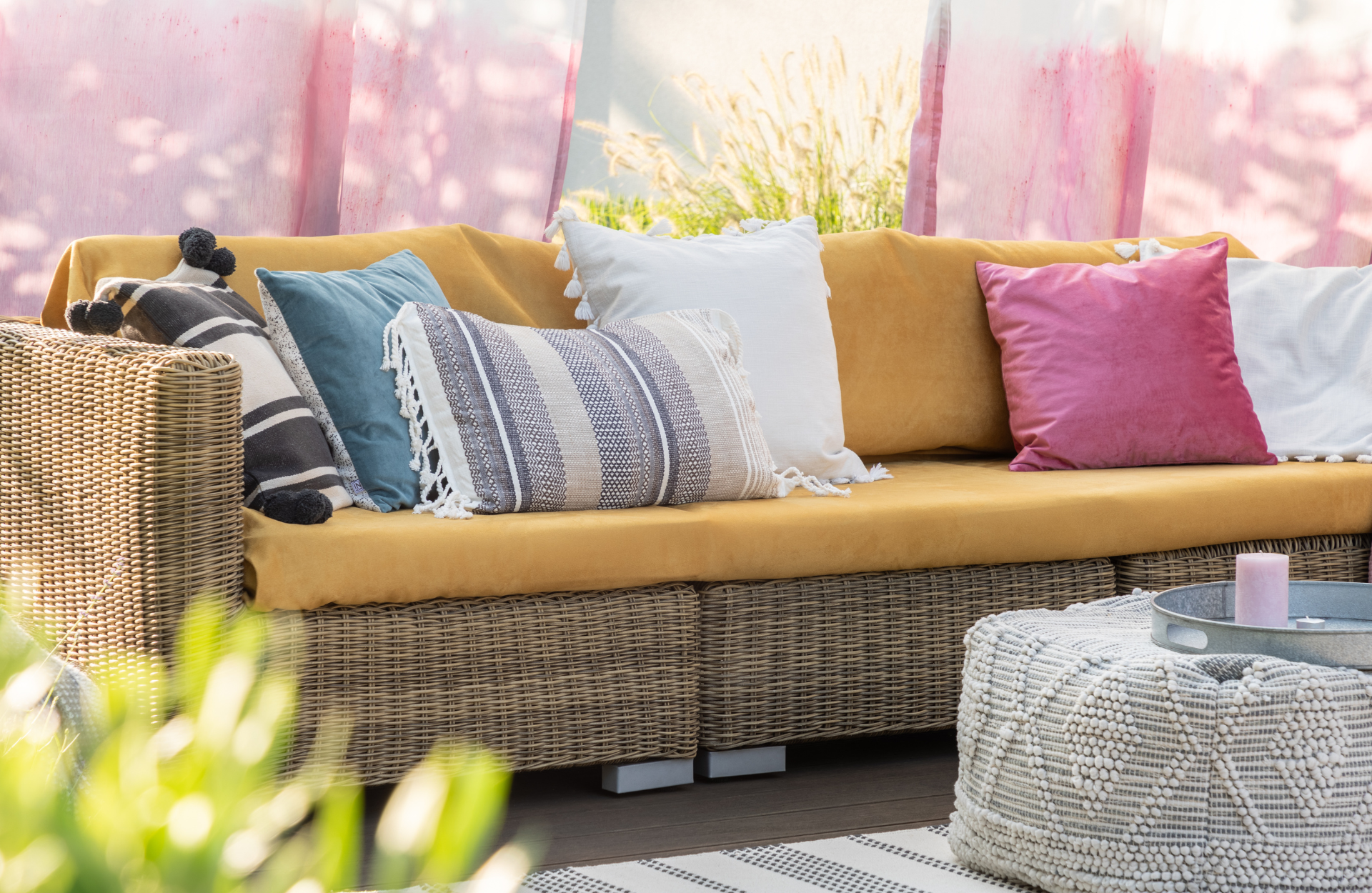 Outdoor sofa with colourful pillows