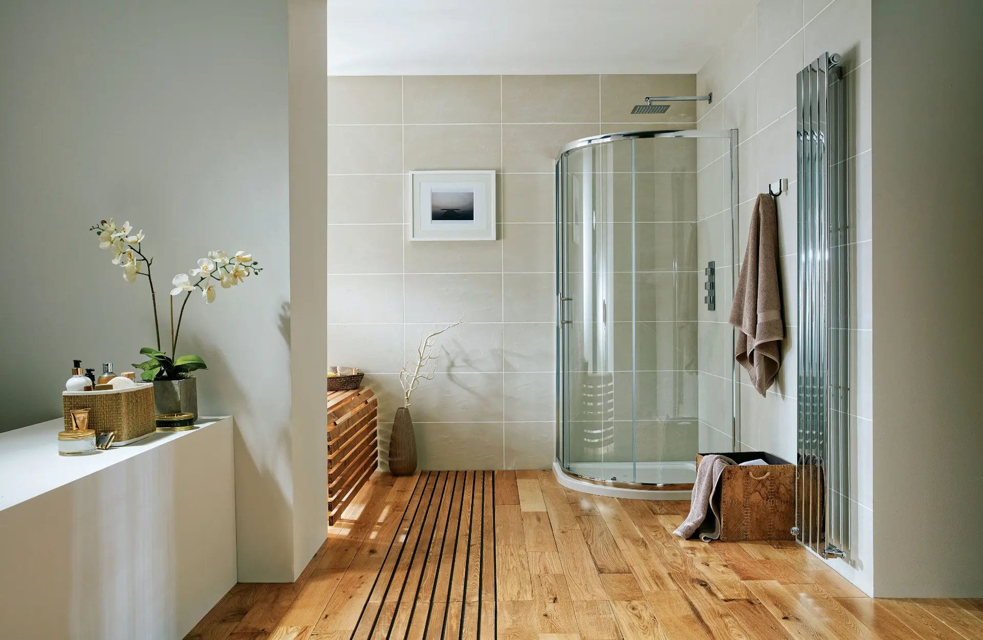 Oak floor bathroom with corner shower
