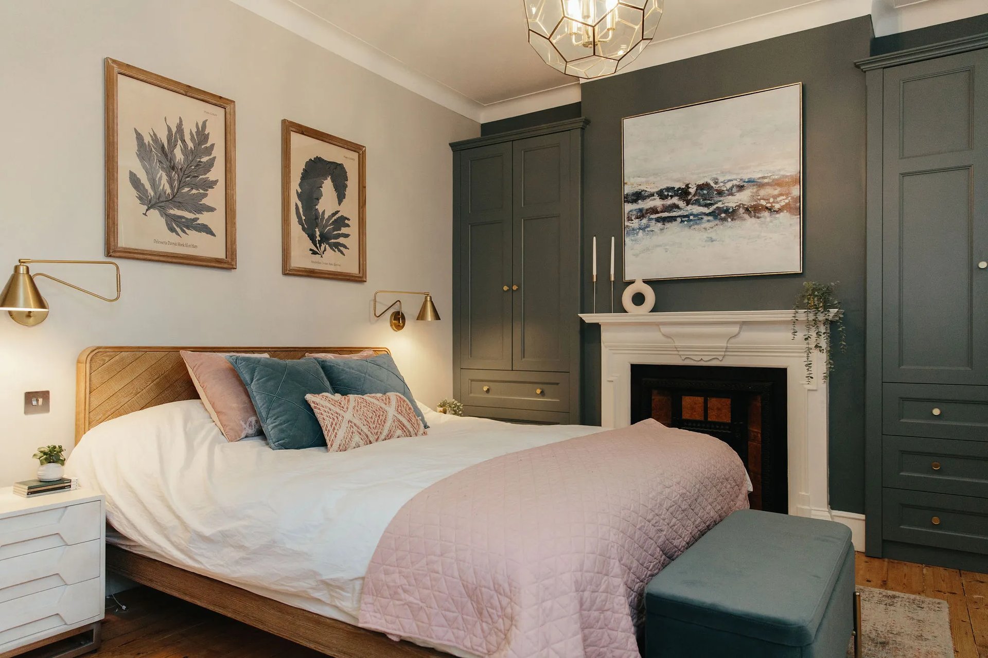 Victorian home | Pink and blue bedroom with fitted fireplace alcove storage
