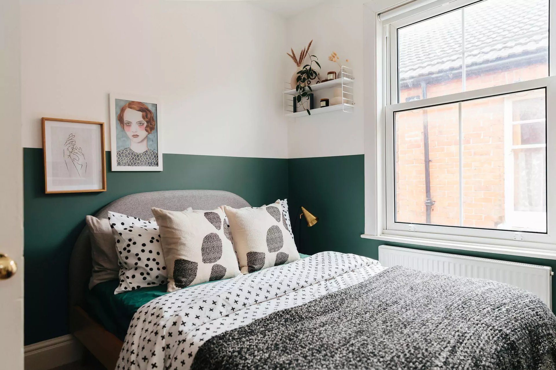 Bedroom with green half painted wall