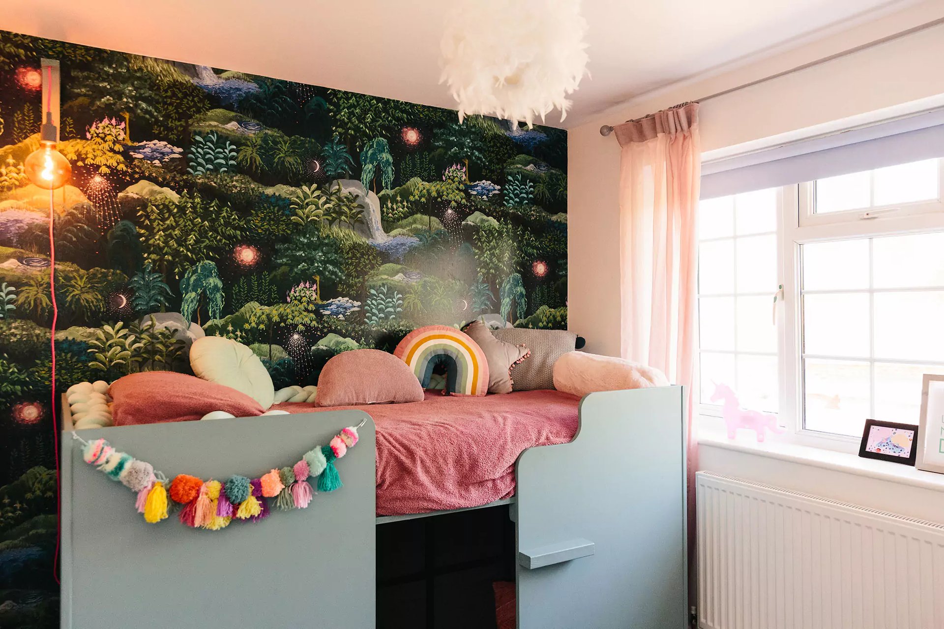 Childrens bedroom with wallpaper feature wall