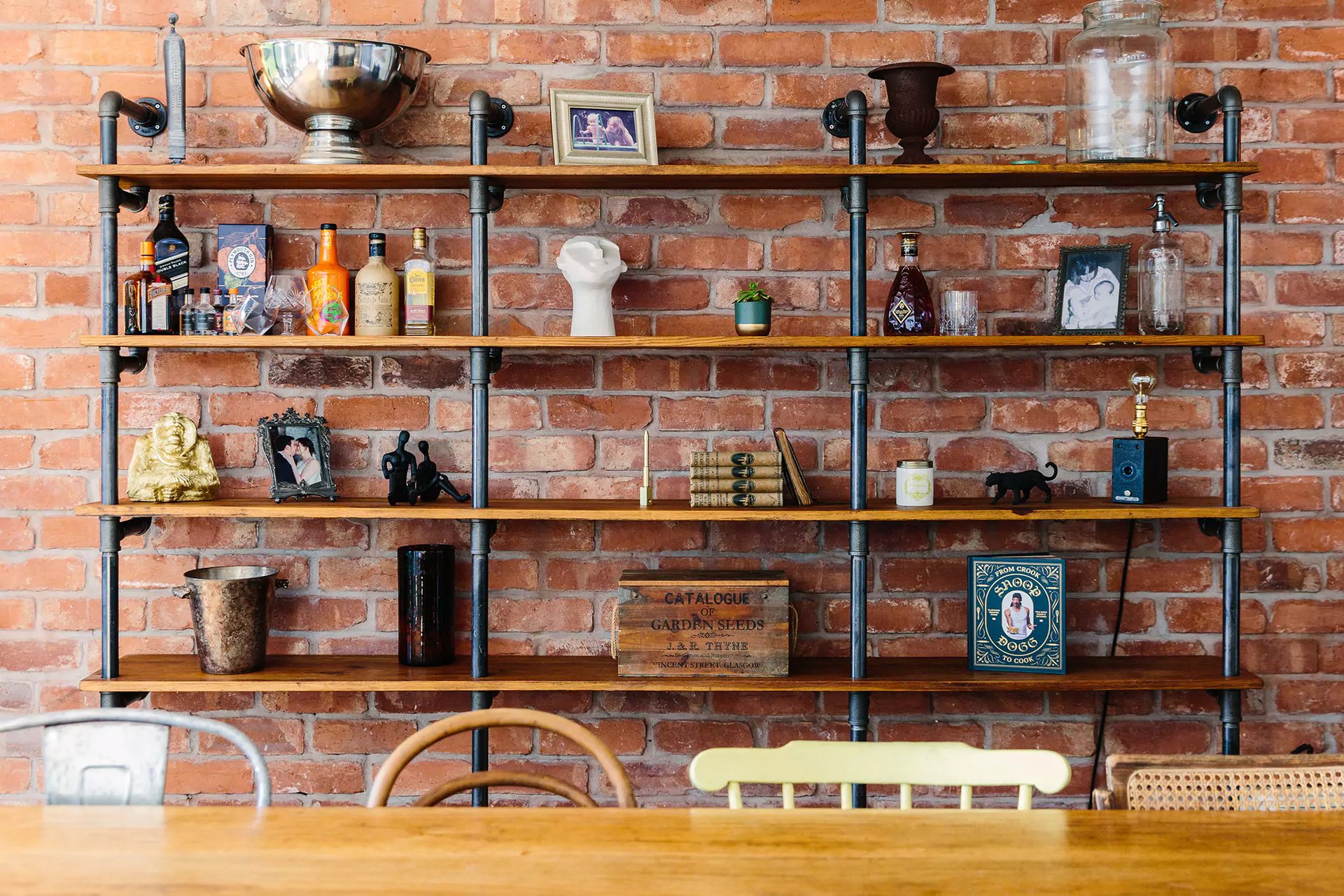Industrial style shelves in dining room
