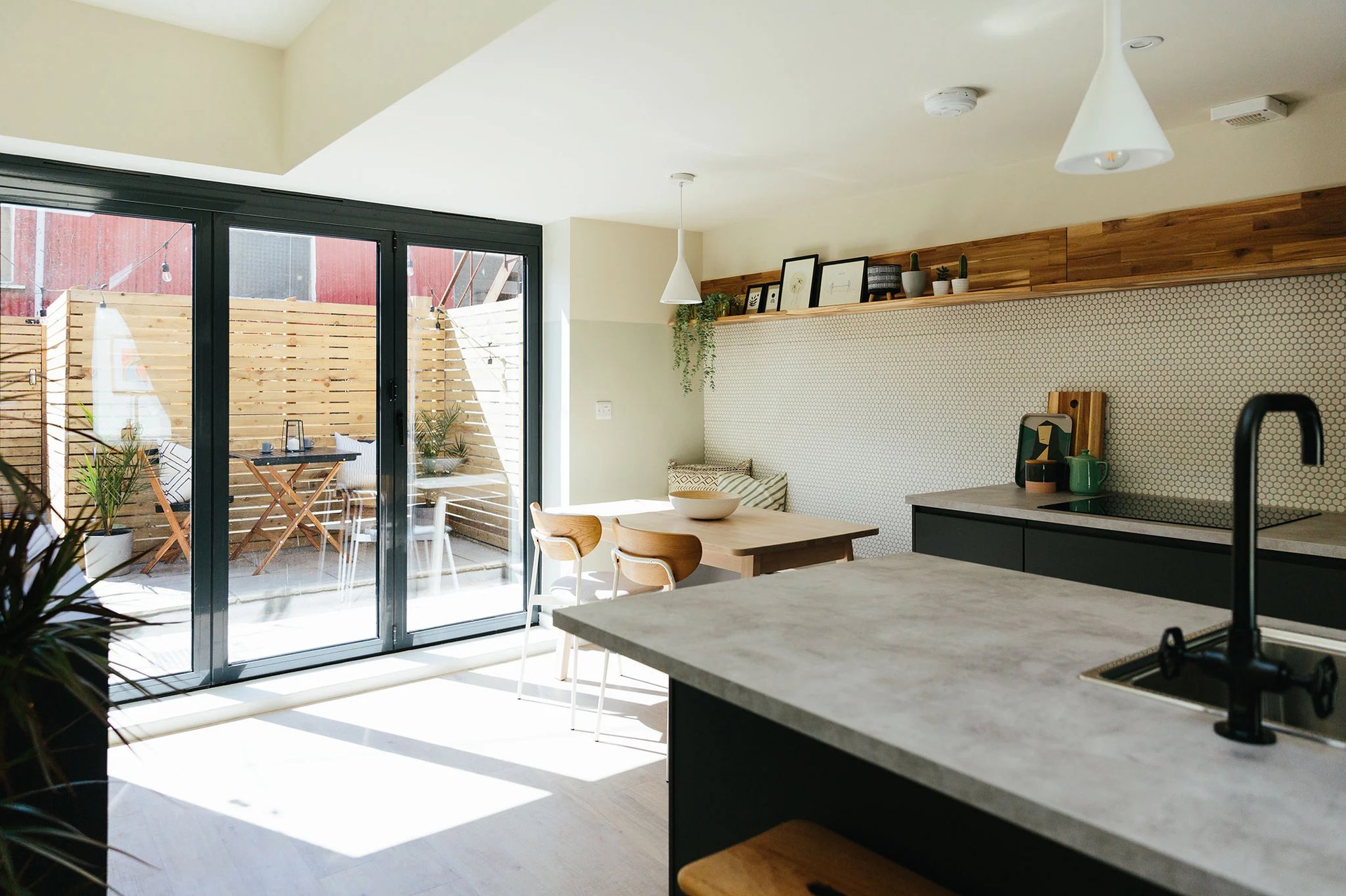 Bright and open kitchen with bifold doors