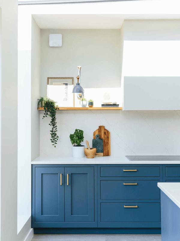 matte blue kitchen with white marble