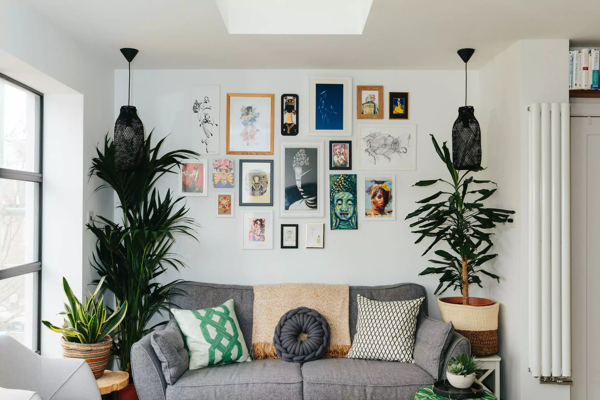 Ecclectic gallery wall in white living room