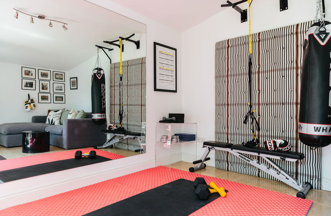 Garden room with gym equipment 