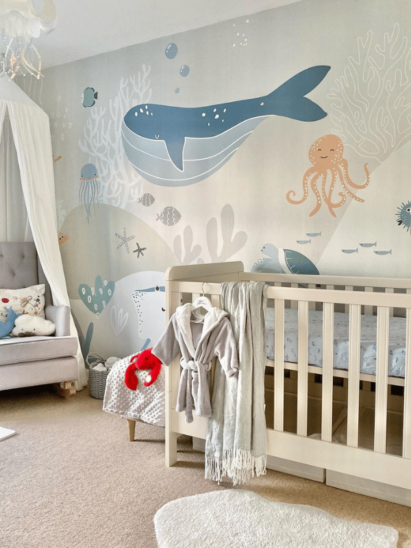 Nursery with ocean wall mural