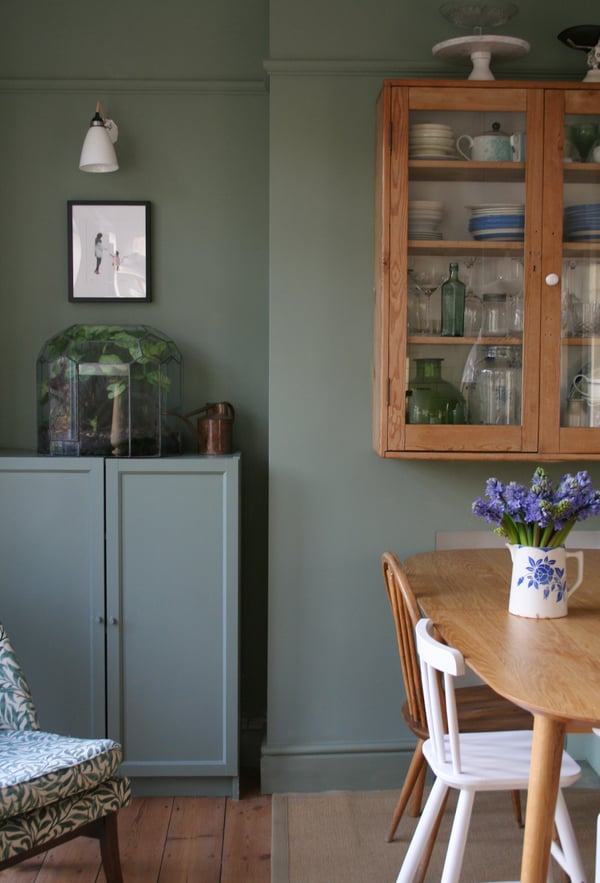 Sage green wall paint | Green dining room.